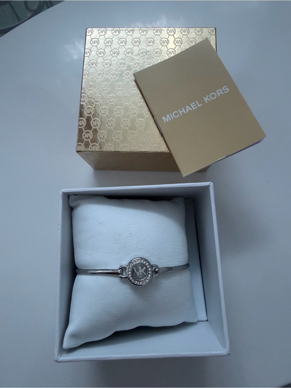 Michael Kors Silver Tone Logo Crystal Accent Bangle Bracelet